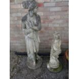 Two composite garden statues, Pandora & another (outside)