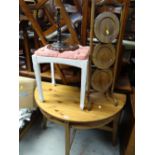 A three-tier circular cake stand, a half moon pine table etc