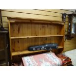 A honey pine three-drawer three-cupboard kitchen dresser