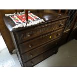 A Priory linen-fold or similar four-drawer chest