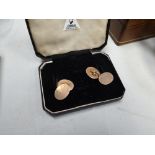 A boxed pair of 9ct gold cufflinks