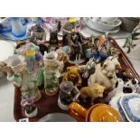 A tray of various mixed ceramics including continental figures, ceramic animals etc