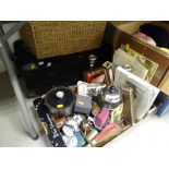 A crate of various household items including ice bucket, cafetiere, brass ornaments, wicker basket &