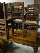 A rustic kitchen table & four chairs