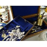 A canteen cutlery box containing a selecetion of knives & decorative spoons (not matching) & a set