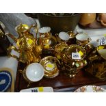 A tray of various continental lustre ware, coffeeware together with a Wade lustre jug