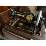 A cased Jones vintage sewing machine
