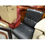 A modern black leather effect chair & another