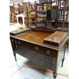 A mahogany dressing table with a bank of five drawers