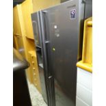 A good Samsung American-style fridge freezer with ice machine dispenser E/T