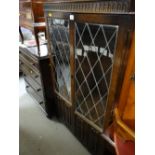 A Priory or similar linen fold two-door bookcase