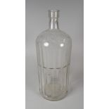 A VINTAGE CLEAR GLASS BOTTLE MARKED 'POISON', 34cms high (BBC Bargain Hunt)