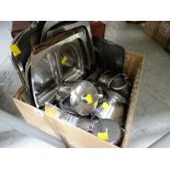 A box of various stainless steel kitchen & teaware