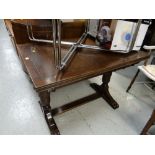 A vintage draw leaf dining table