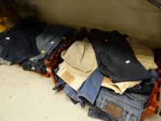 Two crates of various sized men's denim jeans including Levis, M&S etc