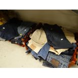 Two crates of various sized men's denim jeans including Levis, M&S etc