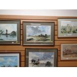 Three framed watercolours of Dutch scenes, signed McWEENEY together with a framed watercolour of