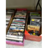 Two boxes of various DVDs