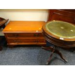 A reproduction drum-top side table with green leather tool top together with a reproduction yew TV /