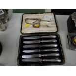 A cased set of six hallmarked silver handled tea knives, sugar tongs etc