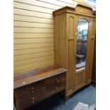 A neat Edwardian oak single mirror door wardrobe together with a vintage part dressing table