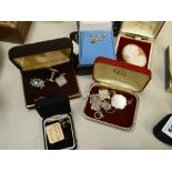 A parcel of silver & white metal cuff links, 9ct gold earrings, cameo brooches etc