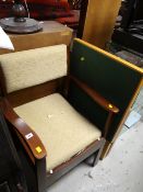 A baize lined folding card table & an upholstered elbow chair