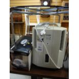 A Delonghi dehumidifier & a Swan teasmade E/T