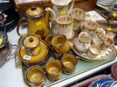 A treacle patterned coffee & teaset by Fosters Pottery together with a Japanese stoneware coffee