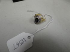 An 18ct sapphire diamond cluster ring