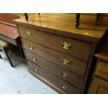 An antique mahogany chest of four long drawers