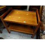 A retro teak tea trolley