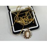 A 9ct gold boxed diamond pendant, 9ct gold neck chain & 9ct cameo pendant