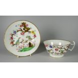 A SWANSEA PORCELAIN BREAKFAST CUP & SAUCER printed and enamelled with 'Chained Parakeets' within a