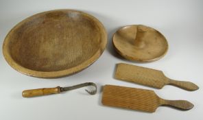 A PARCEL OF FARMHOUSE TREEN comprising bowl, 37cms diam, butter-worker, butter-curler and two