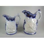A GRADUATED PAIR OF YNYSMEUDWY JUGS (attributed to) with relief decoration to both sides of two boys