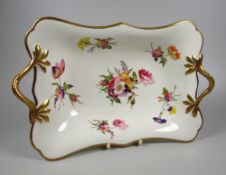 A SWANSEA PORCELAIN TWIG-HANDLED PEDESTAL DISH of shaped rectangular form, the interior painted with