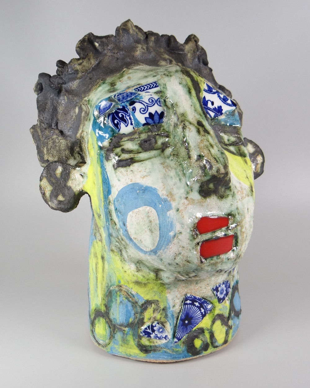 MARY JONES pottery and imbedded shards of crockery with paint - head and neck bust, signed, 32cms