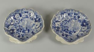 A PAIR OF SWANSEA POTTERY PICKLE-DISHES in the form of scallop shells on two pointed feet with