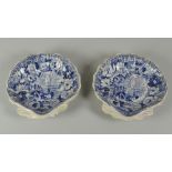 A PAIR OF SWANSEA POTTERY PICKLE-DISHES in the form of scallop shells on two pointed feet with