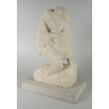 PAN THEODOSIOU stoneware sculpture - two figures embracing, mounted to a rectangular stoneware base,