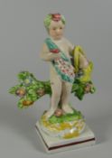 A RARE SWANSEA CAMBRIAN POTTERY PUTTO circa 1810-1815, flower picking while standing against a