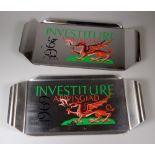 A PAIR OF PAINTED STAINLESS STEEL INVESTITURE TRAYS to commemorate Prince Charles invesiture on July