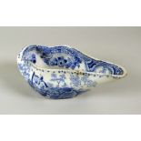 A RARE BEVINGTON PERIOD SWANSEA POTTERY PAP-BOAT with the blue and white 'Harper' transfer featuring