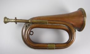 A WELSH MILITARY BUGLE in mainly copper, late nineteenth century, engraved Victoria cypher, crowns