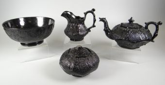 A RARE LLANELLY FOUR-PIECE MOURNING TEA-SERVICE for Prince Albert, circa 1861, with blacked