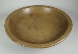 A SYCAMORE WELSH DAIRY BOWL with turned rim, 35cms diam