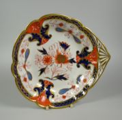 A SWANSEA PORCELAIN 'JAPAN' PATTERN FAN-HANDLED DISH of lobed form, the handle & rim picked out in