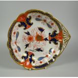 A SWANSEA PORCELAIN 'JAPAN' PATTERN FAN-HANDLED DISH of lobed form, the handle & rim picked out in