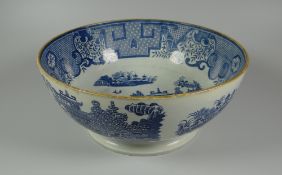 AN EARLY NINETEENTH CENTURY SWANSEA CAMBRIAN POTTERY FOOTED BOWL in the blue & white transfer '